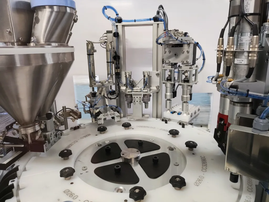 CC1160 Automatic Powder Filling Monobloc Machine, with multiple stations.