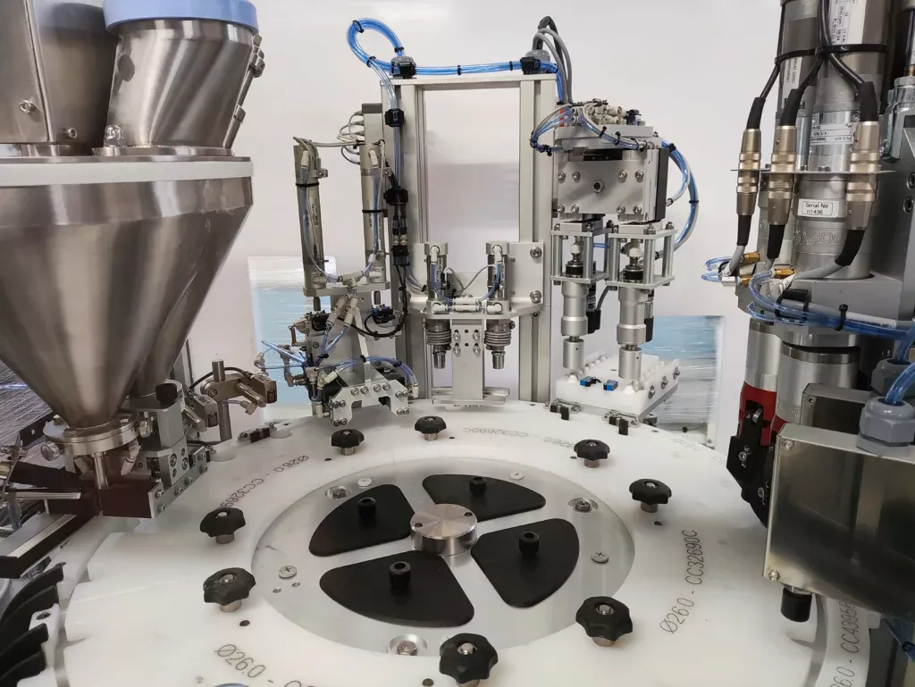 CC1160 Automatic Powder Filling Monobloc Machine, with multiple stations.