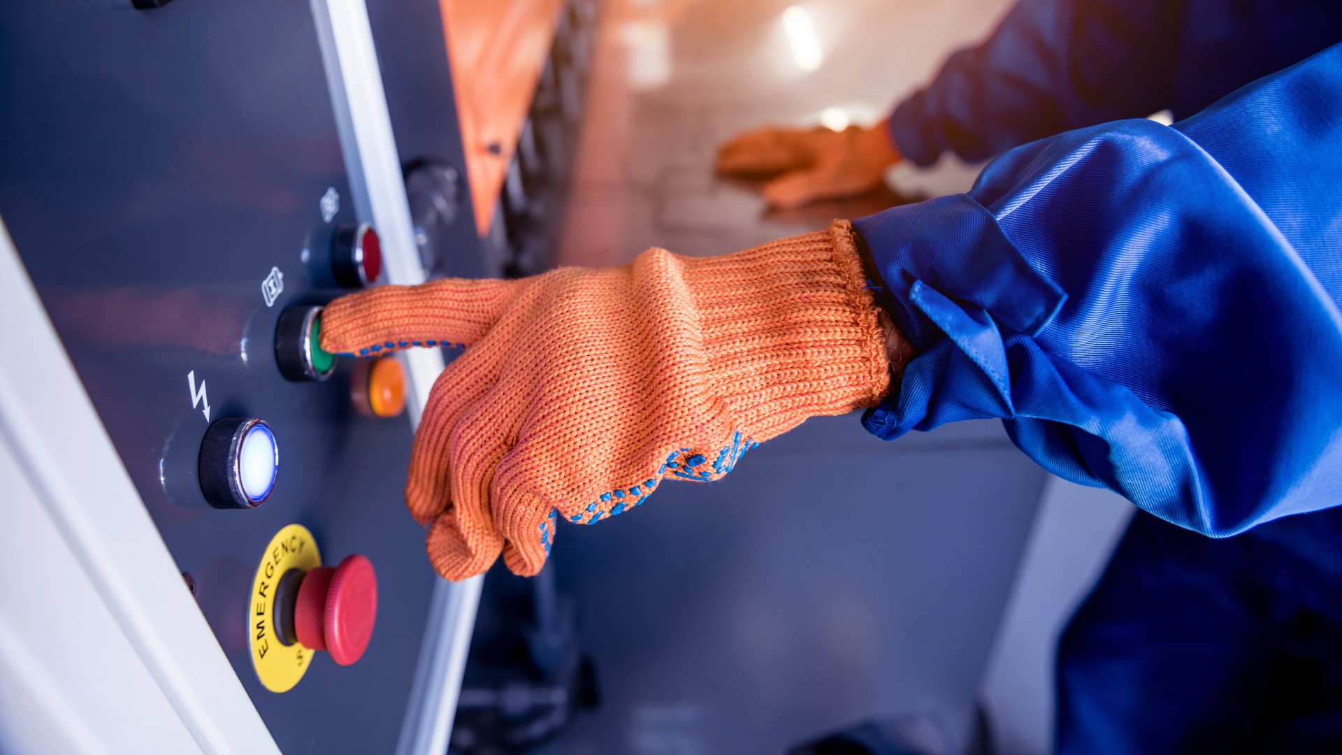 Operator performing setup on automated capping system.