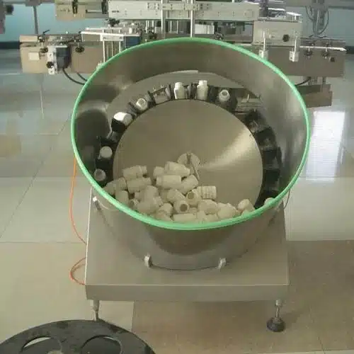 Bottle sorting machine automatically organizing bottles for smooth production.