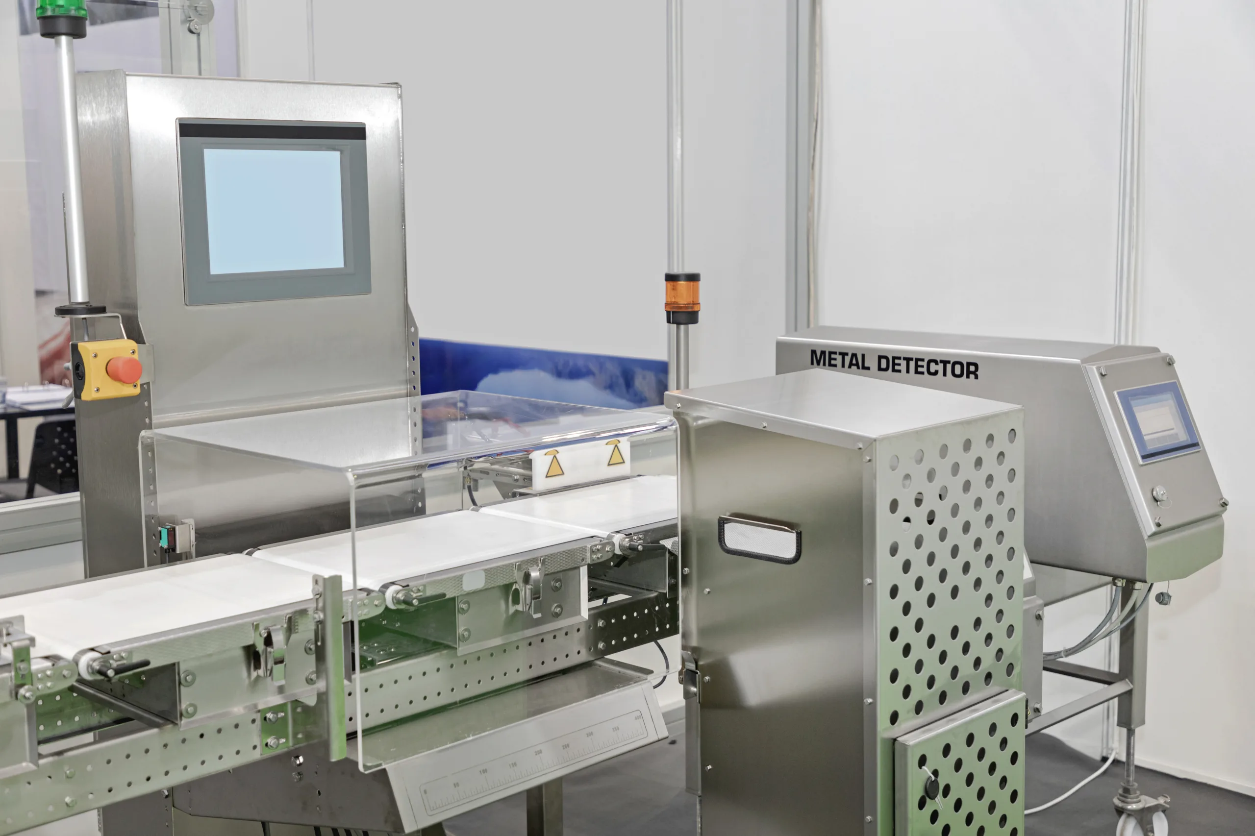 Inline check-weighing machine ensuring accurate product weights on the production line.